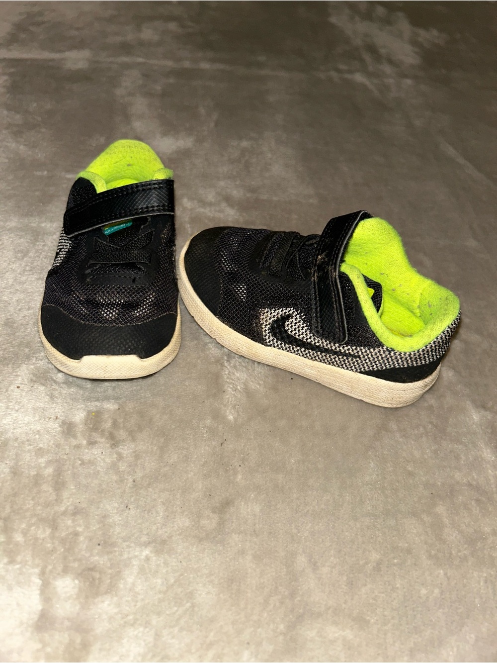 Nike Kids Black Sneakers with Neon Yellow Lining